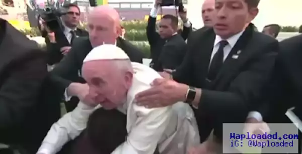 Pope loses his cool with person who almost knocked him down (photos)